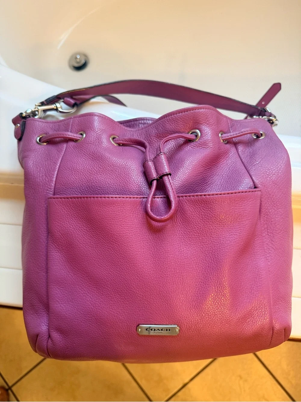 Coach Pebbled Leather Drawstring Hobo in Brick Red